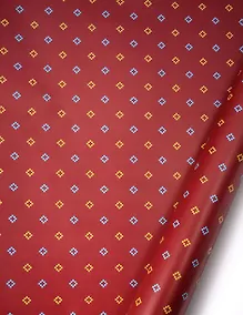 Купить Бумага упаковочная 70*100см "Ромбики на бордовом фоне" глянц., инд.уп. — Фото №1