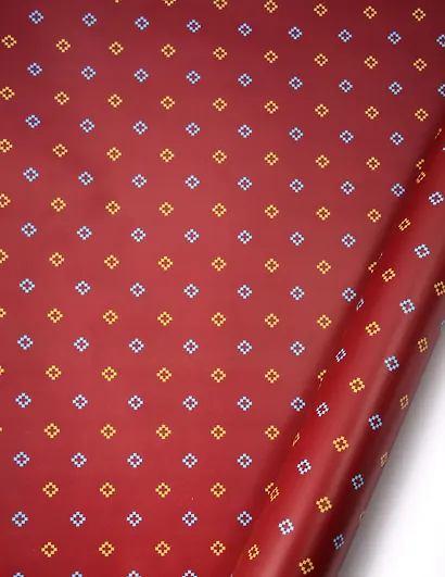 Бумага упаковочная 70*100см "Ромбики на бордовом фоне" глянц., инд.уп. - фото 1